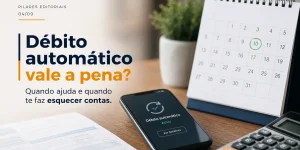 Smartphone com status de débito automático ativo na mesa