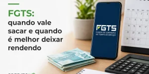 Celular com logo FGTS, calendário e dinheiro na mesa